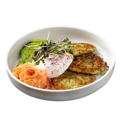 Isolated zucchini pancakes breakfast with salmon and avocado