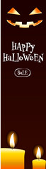 ハロウィンのバナー、暗闇で光るジャック・オー・ランタンとロウソク