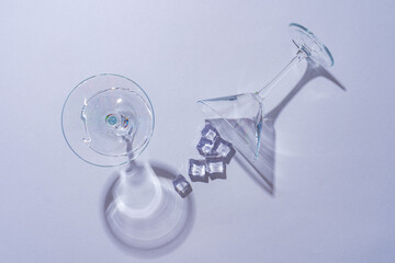 Two empty wine glass on gray background top view