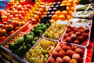Colorful fruit berries are displayed in a market