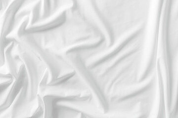 Fototapeta premium White fabric. luxurious white fabric texture background. Creases of satin, silk, and cotton.