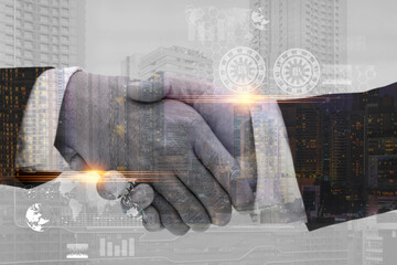 Close up of handshake on abstract city background.Teamwork concept.