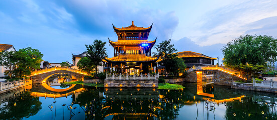 Chinese traditional pavilion building. ancient Chinese architecture at night, made of wood.