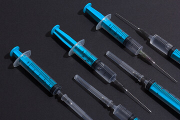 Disposable plastic syringe prepared for injection and vaccination in the hospital. The concept of medicine and health