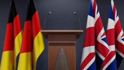 Flags of Germany and United Kingdom at international meeting or negotiations press conference. Podium speaker tribune with flags and coat arms. 3d rendering