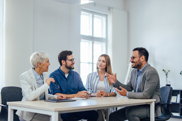 Business partners having a business meeting, making a plans for the new company project.