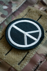 No war! Peace Sign velcro patch on camo equipment