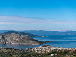 Tree Islands plus one. Aegina, Agistri, Moni and Peloponnese in the far background. Travelling in alluring Saronic gulf sea. Greek destinations around Athens.