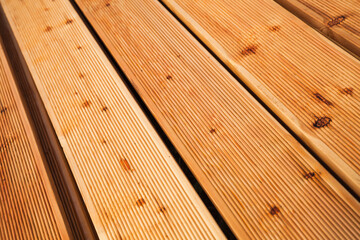 Larch deck boards flooring, close up photo