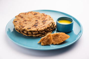 Sweet roti made out of rice flour, jaggery, and ghee. Gud ki roti. gur ki roti, jaggery Bhakri, meethi gud ki roti. Winter food. Copy space.