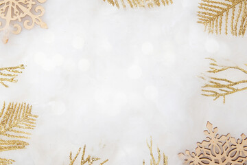 Decorative golden twigs in glitter and bokeh light with copy space Christmas and New year background