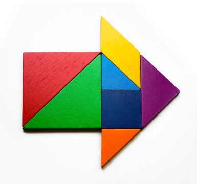 Color wood tangram puzzle in arrow or home shape. isolated on white background. teamwork, brainstorming idea, sign, concept. synergy symbol.