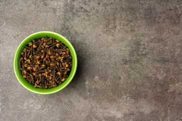 High quality photo of cloves with a dramatic concept on a dark background.