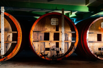 Old and modern equipment for distillation of strong alcoholic apple drink calvados in Normandy, Calvados region, France