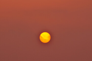 sun ray is go down and amazing dramatic orange cloud