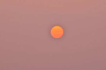 sun ray is go down and amazing dramatic orange cloud
