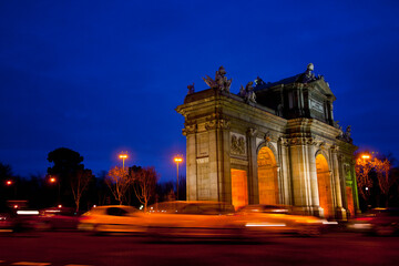 Fototapeta premium The famous Puerta de Alcala at night in the city of Madrid capital of Spain