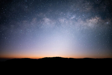 Beautiful view on top of the mountain, night sky, star and Milky Way over the sky.