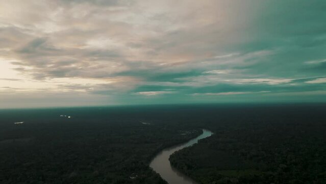 Aerial panning shot of river channel of Amazon . Aerial drone of S bend amazon river. Aerial View of Amazon Rainforest in Brazil. 

