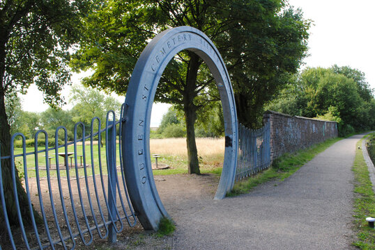 Circular Steel Entrance to Cemetery on Canal Towpath 