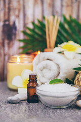 Background spa cosmetics and oils and herbs. Selective focus.