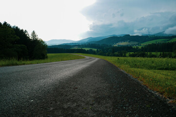Austria, land of Styria. Beautiful mountain landscape in a mountain village after rain. The beautiful nature of Austria, the road in the mountains.