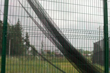 Net on sports field. Fence details.