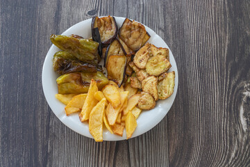 Traditional delicious Turkish food, fried mixed vegetables (potato, zucchini, eggplant, roasted pepper), Turkish name; stir fry vegetables