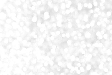 White and gray bokeh background. Photo can be used for the concepts of New Year, Christmas, Wedding Anniversary and all celebrations.
