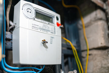 Smart electric power meter counter measuring power usage.Close-up of modern smart grid residential...