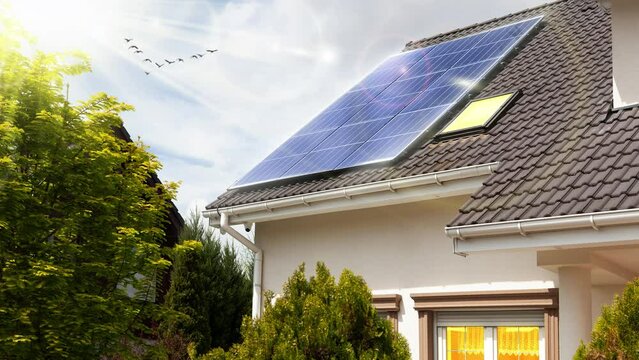 Solar panels on roof. Beautiful modern house and solar energy. Rays of sun. Visualization - video effect