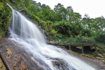 Fototapeta premium Beautiful scenery and fresh cool atmosphere at Silver Waterfall (Thac Bac waterfall) in Sapa,Lao Cai province,North Vietnam.