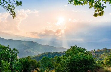 Mountain valley during sunset or sunrise. Natural spring or summer season landscape