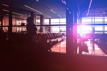 The interior of the lobby airport or office building at sunset - the light comes through the glass...