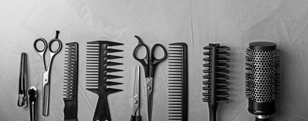 Set of different professional hairdresser tools on grey background, flat lay. Banner design