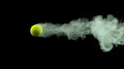 Freeze Motion Shot of Flying Tenis Ball Containing Light Green Powder - obrazy, fototapety, plakaty