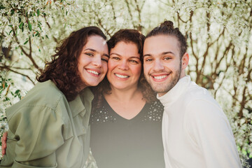 Portrait of a Mother, Daughter and Son in Nature - Happy Family
