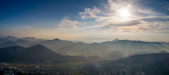 Scenic view of mountains against sky during sunrise