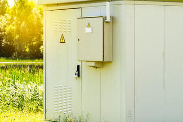 Outdoor electric distribution cabinet with a morning sunlight