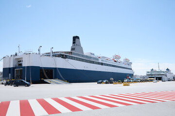 PIRAEUS, GREECE - MAY 19, 2022: Picturesque view of port with Blue Star ferry on sunny day