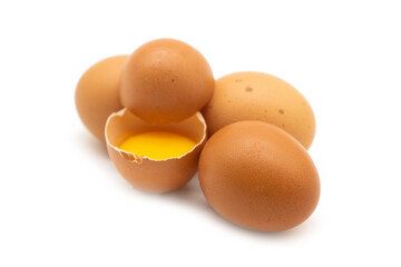 whole eggs and broken isolated on a white background.