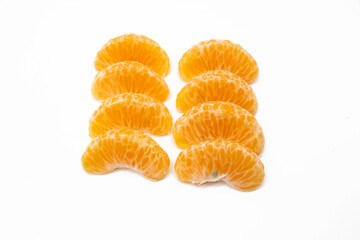 some pieces of tangerine isolated on white background