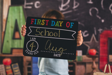 back to school kid pre k child in front of board chalk chalkboard a b c    
