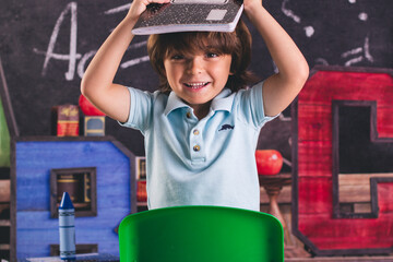 back to school kid pre k child in front of board chalk chalkboard a b c    