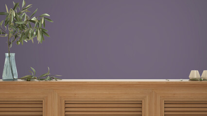 Wooden table top, cabinet, panel or shelf with shutters close up. Olive branch in glass vase, leaves and candles. Purple wall background with copy space, interior design