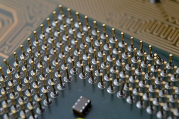 microprocessor on the background of the microcircuit of the motherboard