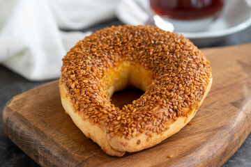 Croissants on dark background. Sweet cookies with sesame topped. Turkish cuisine delicacies. local name ay coregi. Close up