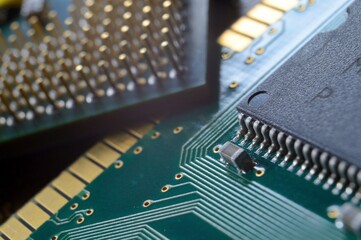 microprocessor on the background of the microcircuit of the motherboard