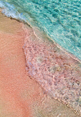 Shallow clear sea with pink sand at Elafonisi, Crete island - Greece