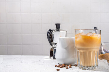 Homemade iced latte coffee, with milk poured Into Iced coffee espresso, Summer cold refreshing drink concept